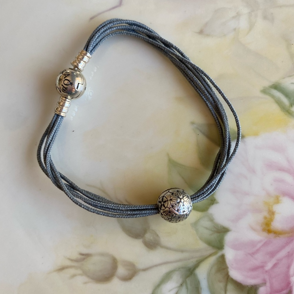 Pandora multi strand cord bracelet with floral clasp bead
